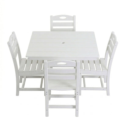 White square outdoor dining table with umbrella hole and four armless chairs set