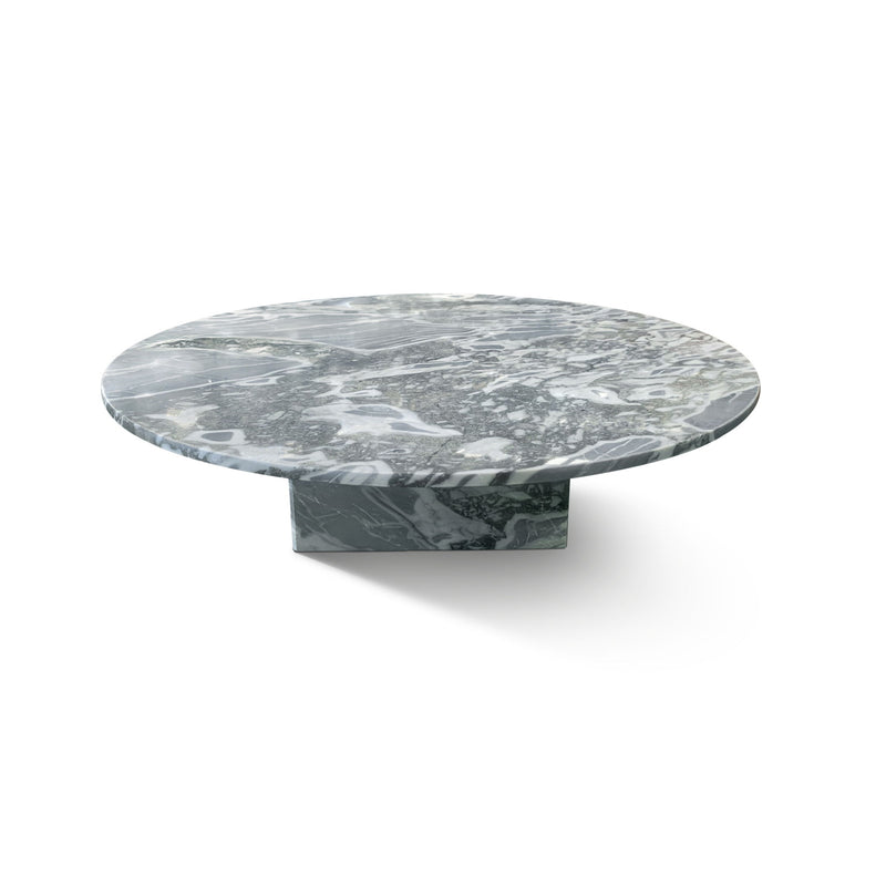 Round gray marble-look coffee table with white speckled pattern and short base