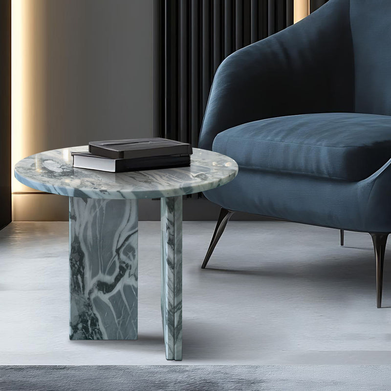 Round gray marble-look coffee table with wavy veins and metal-look pedestal legs