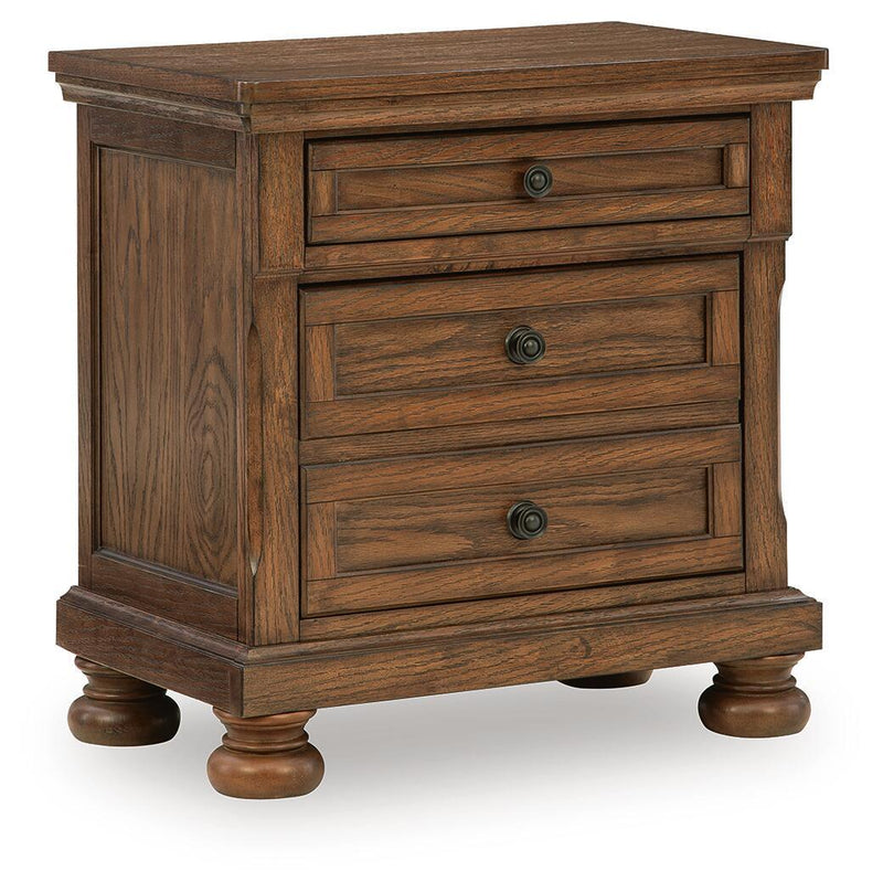 Warm brown wooden nightstand with two drawers, round metal knobs, turned legs
