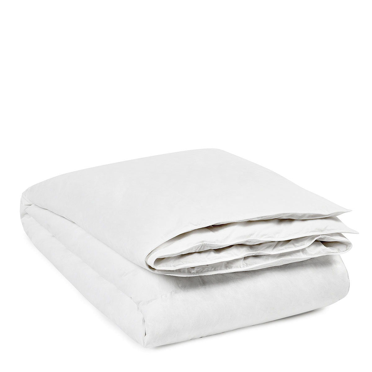 White goose down duvet insert folded into a compact stack