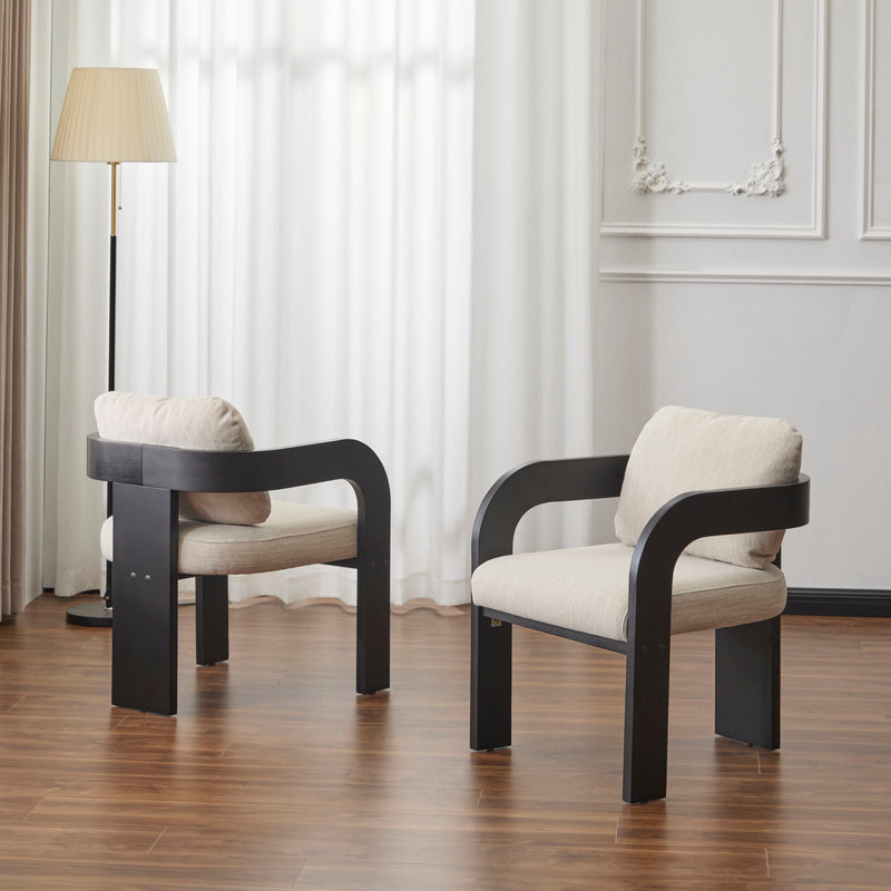 Pair of dining chairs with beige cushions and black frames, shown from the side