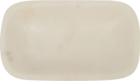 White marble tray close-up, smooth oval dish with subtle spots