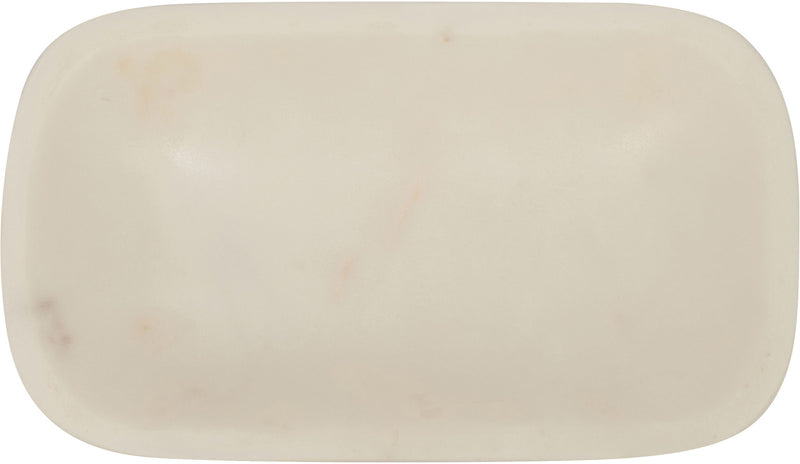 White marble tray close-up, smooth oval dish with subtle spots