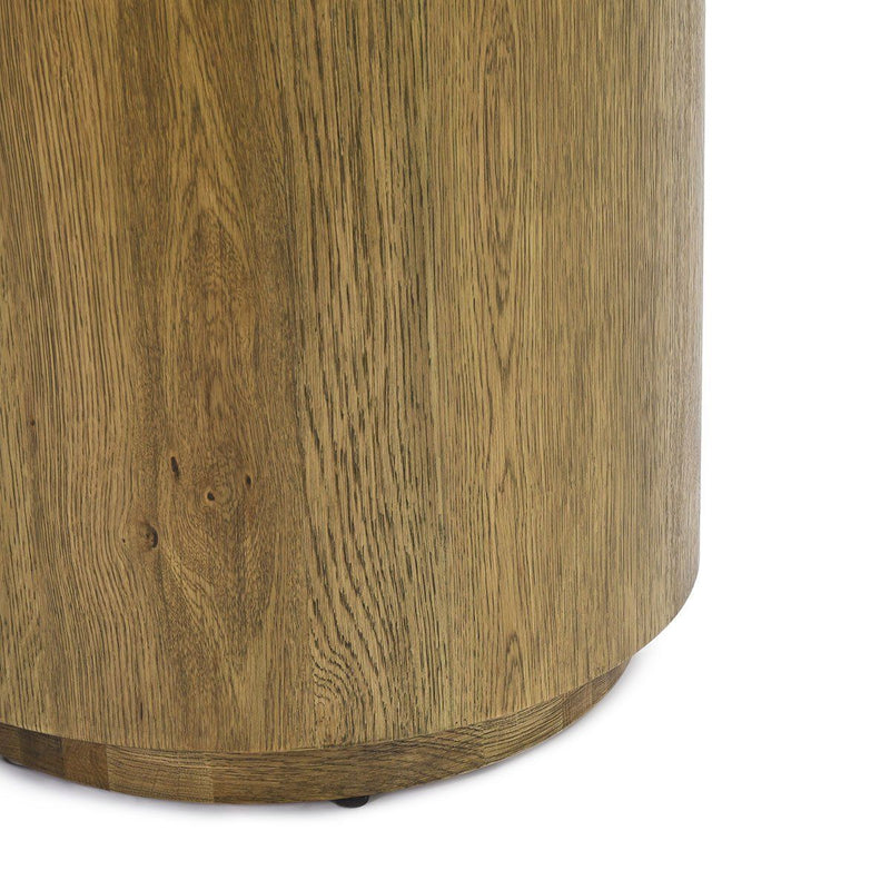 Close-up of light brown wood grain side on round end table