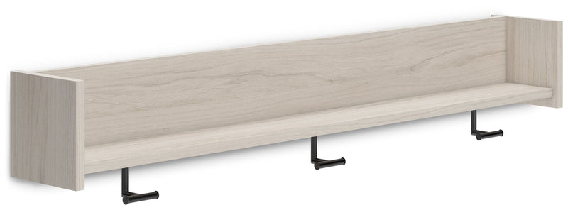 Corner view of wall-mounted coat rack with light natural wood shelf and three hooks