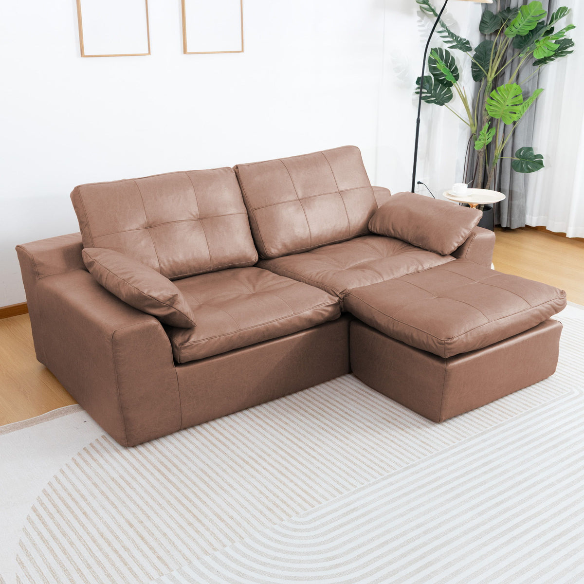 L-shaped 2-seater sofa with movable ottoman, medium brown fabric cushions.