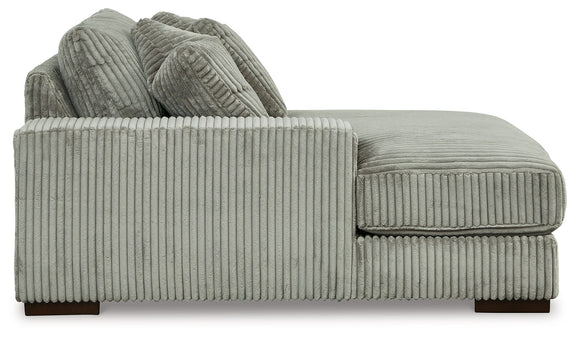 Gray ribbed fabric corner sectional sofa with upholstered arm and tufted back cushions