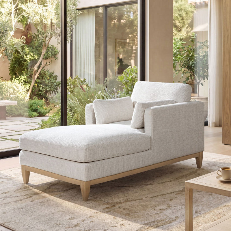 Light beige fabric chaise lounge chair with tufted-style back cushions