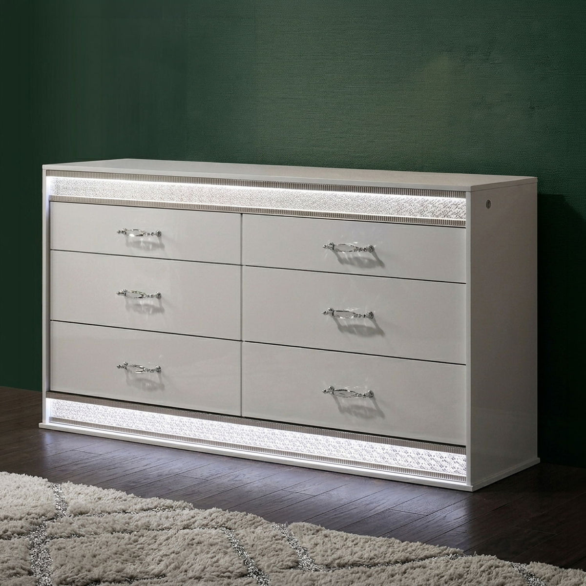 White 6-drawer dresser front with textured border, silver handles, low platform base
