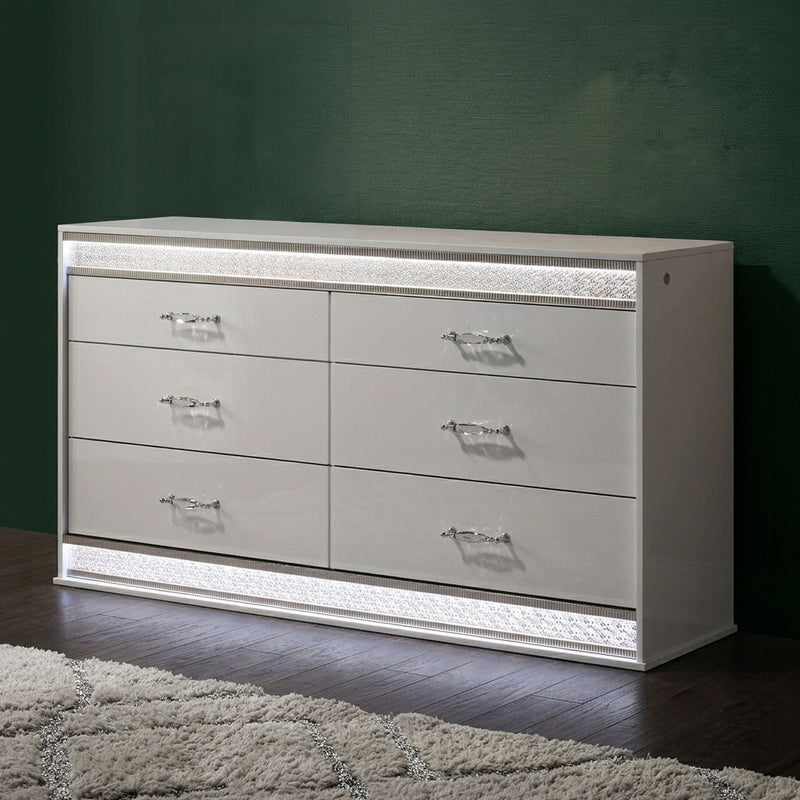 White 6-drawer dresser front with textured border, silver handles, low platform base