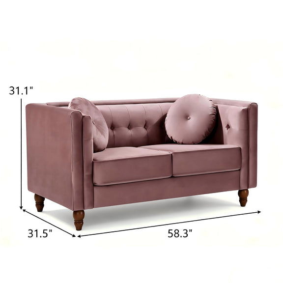 Rose pink 2-seater velvet loveseat with tufted back and round accent pillows