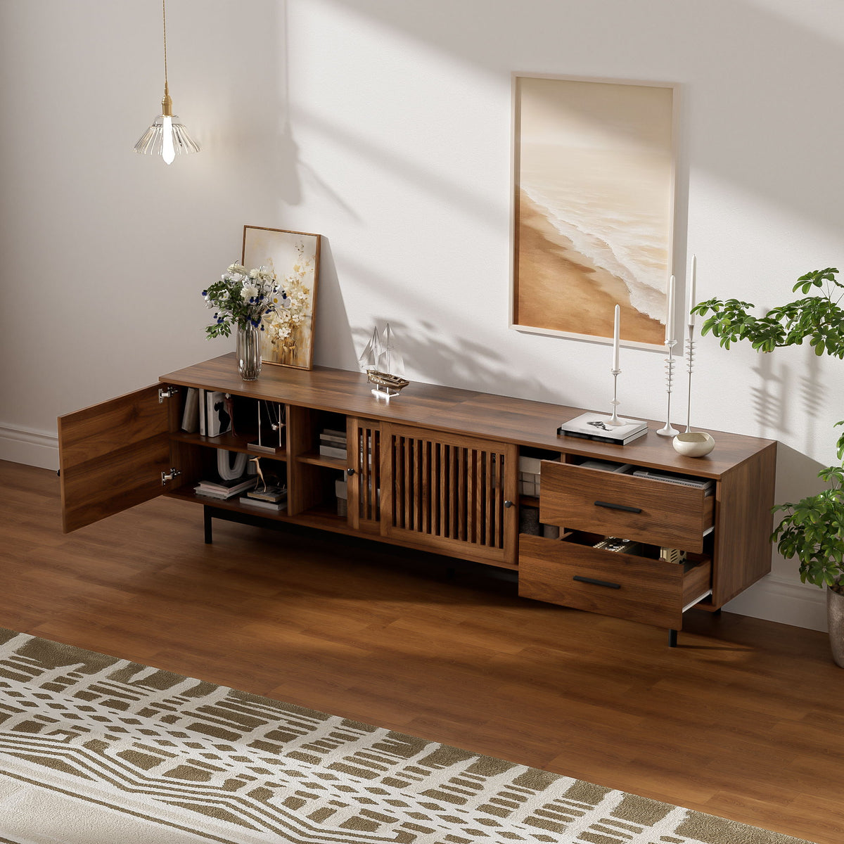 Walnut TV media console with slatted doors, open cubbies, and two side drawers