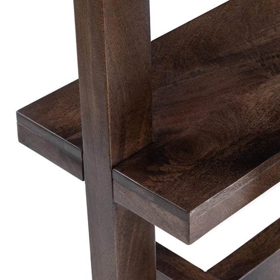 Brown wooden bookcase corner with open shelves and thick vertical posts