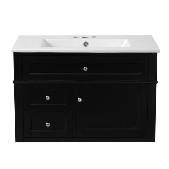 Black wall-mounted bathroom vanity with white sink, two drawers, tip-out drawer and cabinet door.
