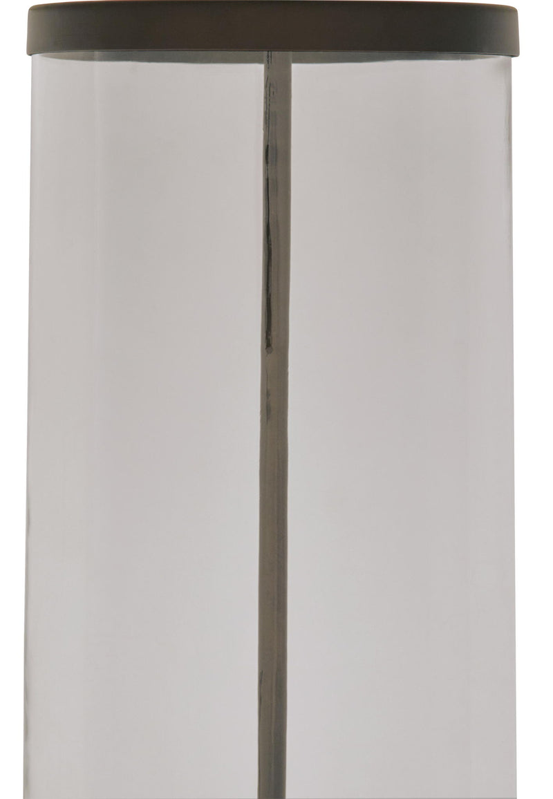 Junrow glass table lamp close-up: clear cylinder with dark top ring and metal stem