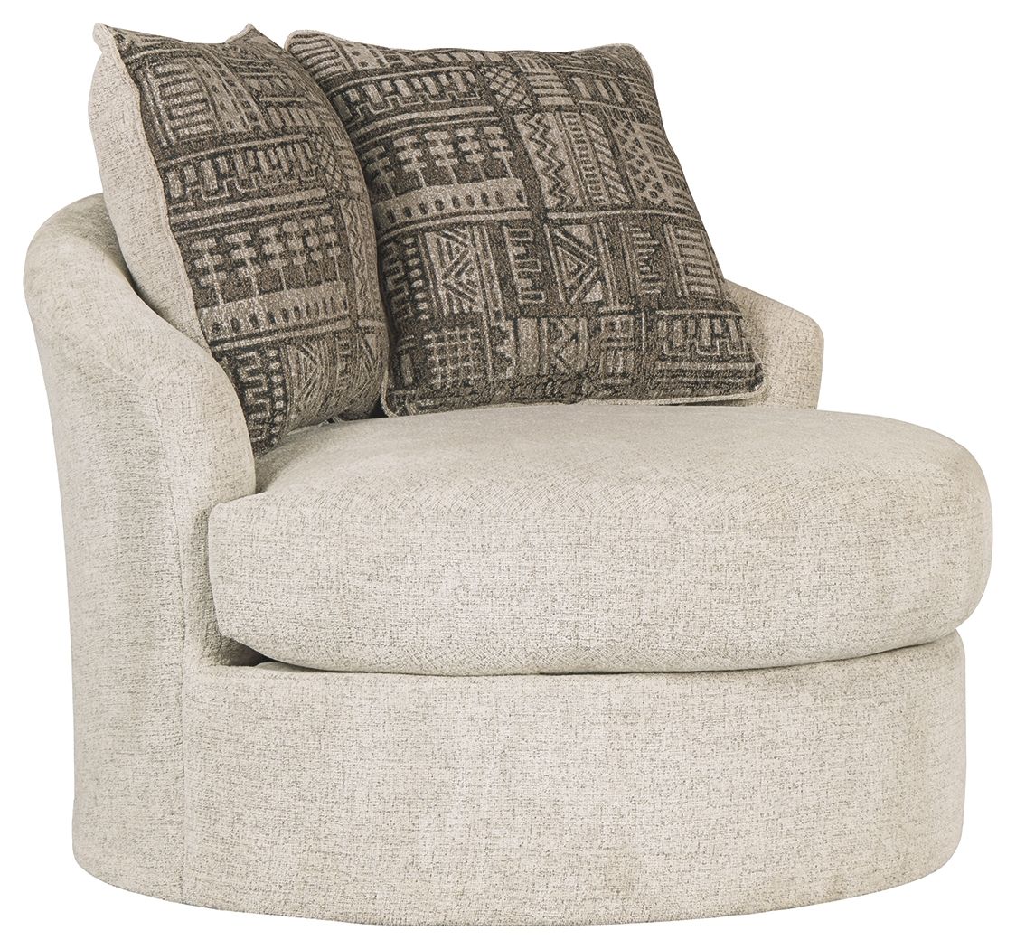 Light beige swivel accent chair with four dark geometric throw pillows