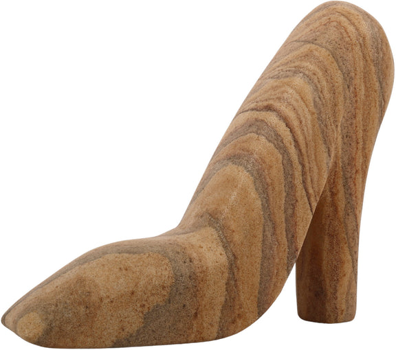 Sandstone tabletop object: tan-and-brown marbled high-heel shoe, angled side view