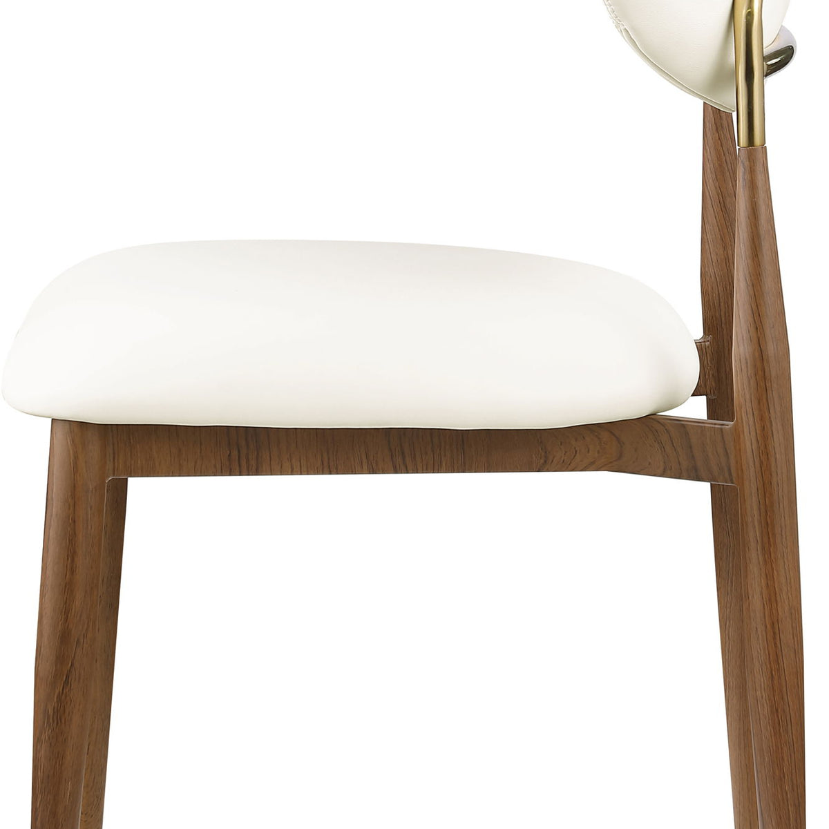 White vegan leather dining side chair, angled view with walnut legs