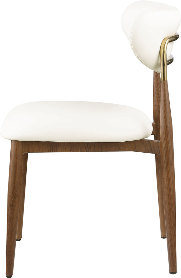 White vegan leather dining side chair, angled view with walnut legs