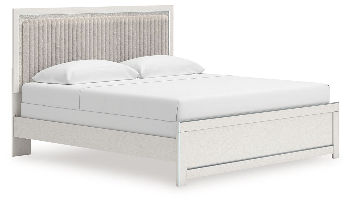 White upholstered panel bed with tall ribbed headboard and low platform frame
