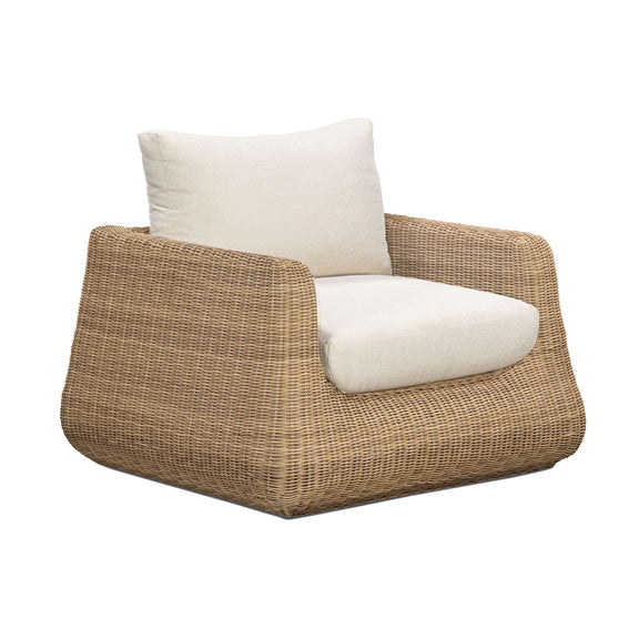 Outdoor accent chair with white cushions, woven wicker frame, side view