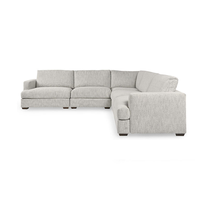 Ivory fabric sectional sofa with chaise extension and blocky back cushions