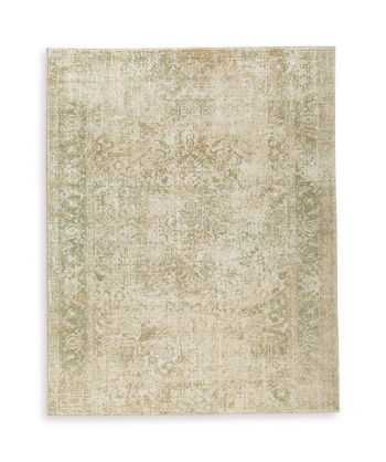 Beige patterned rug with distressed texture