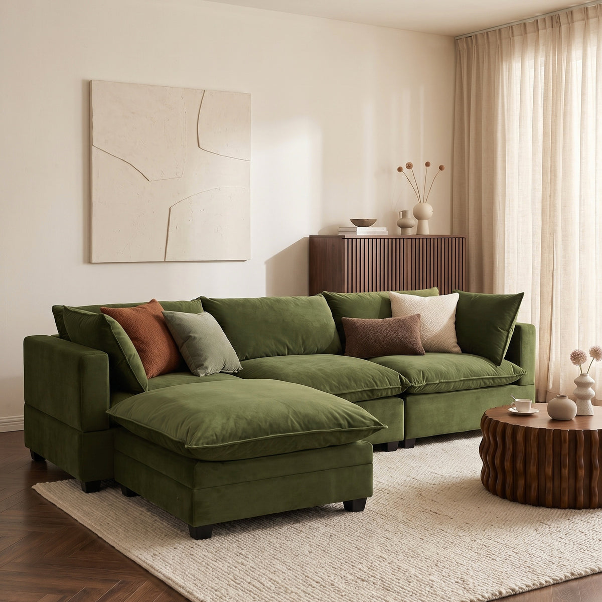 Olive green modular sectional sofa with chaise and accent pillows