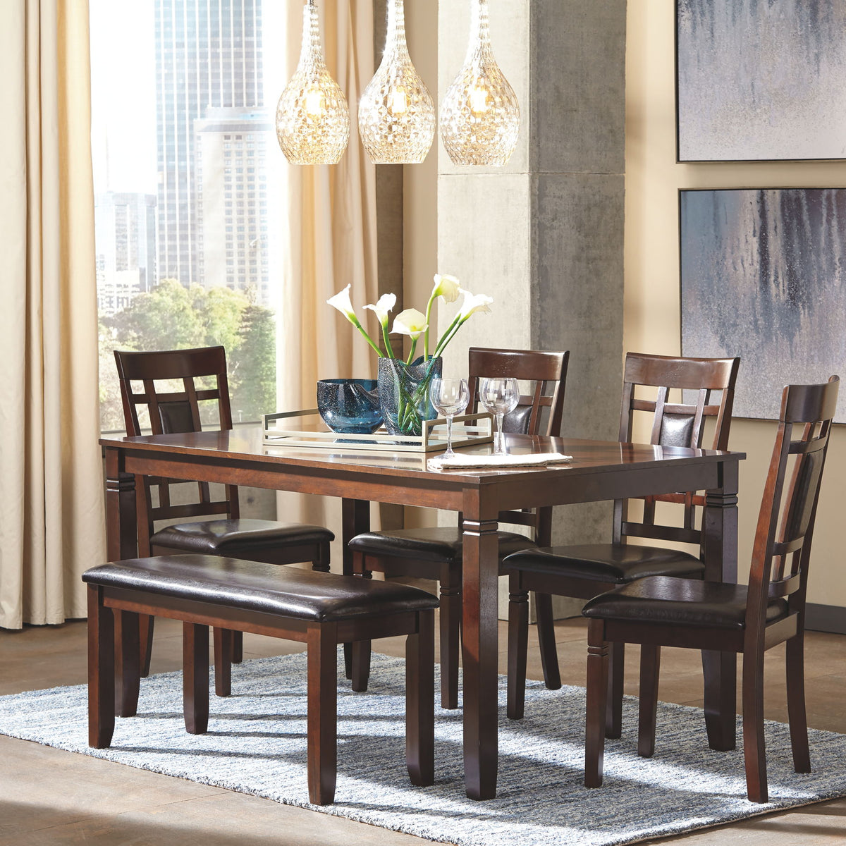 Brown dining room table set with 6 chairs, cushioned benches, and glass tabletop