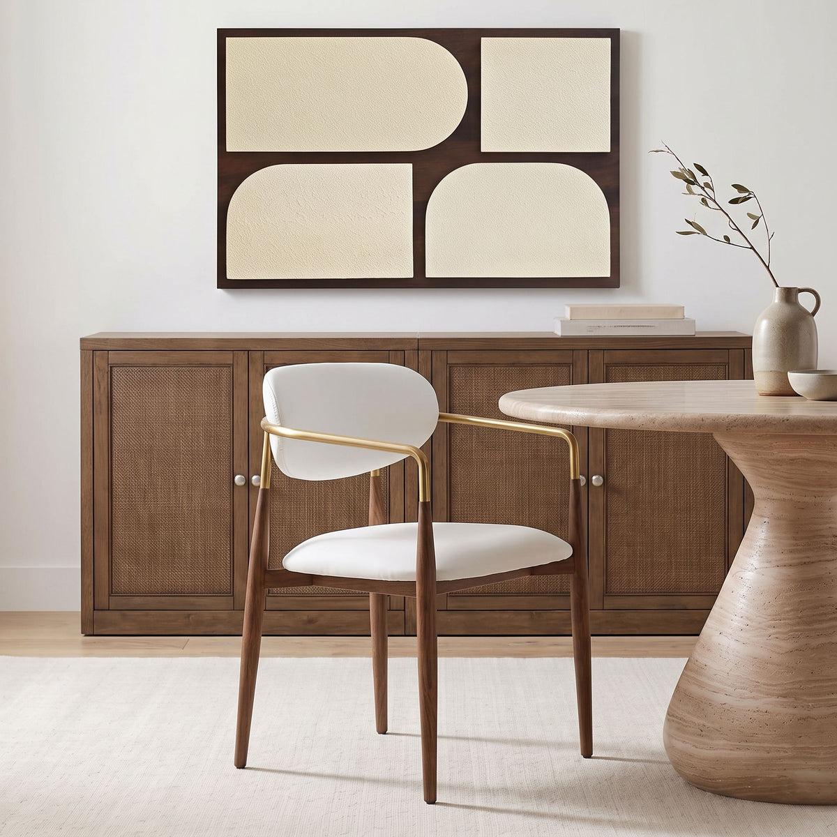 Beige upholstered dining arm chair with gold arms and walnut legs