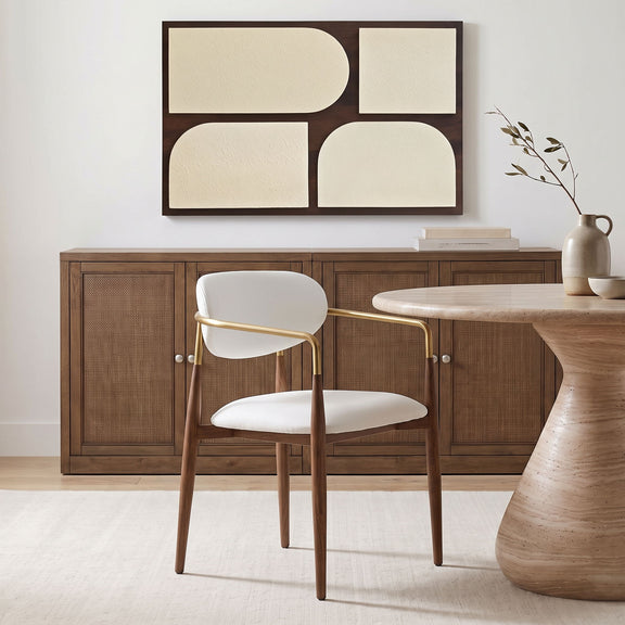 Beige upholstered dining arm chair with gold arms and walnut legs
