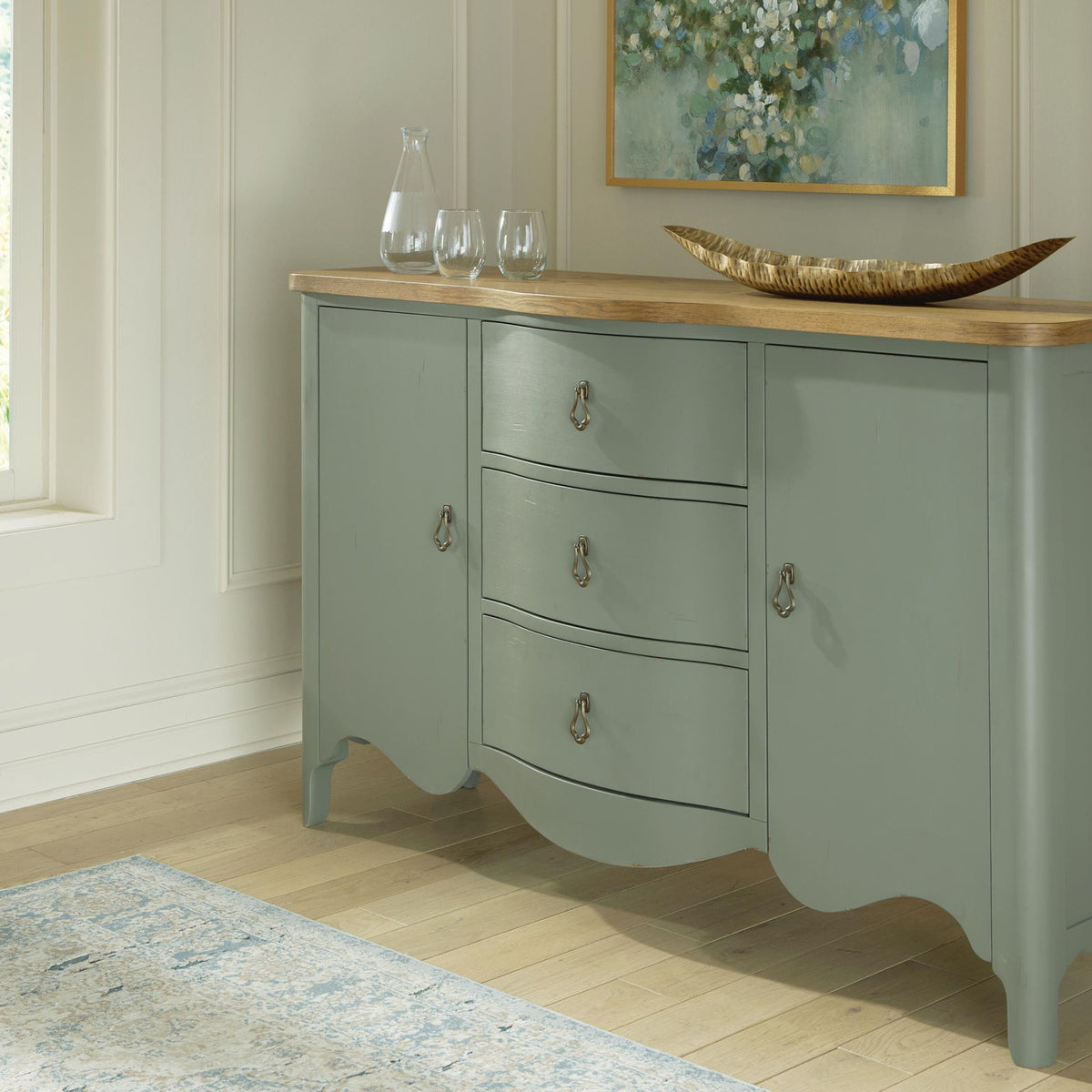 Antique green accent cabinet with scalloped apron, three drawers, brass knobs