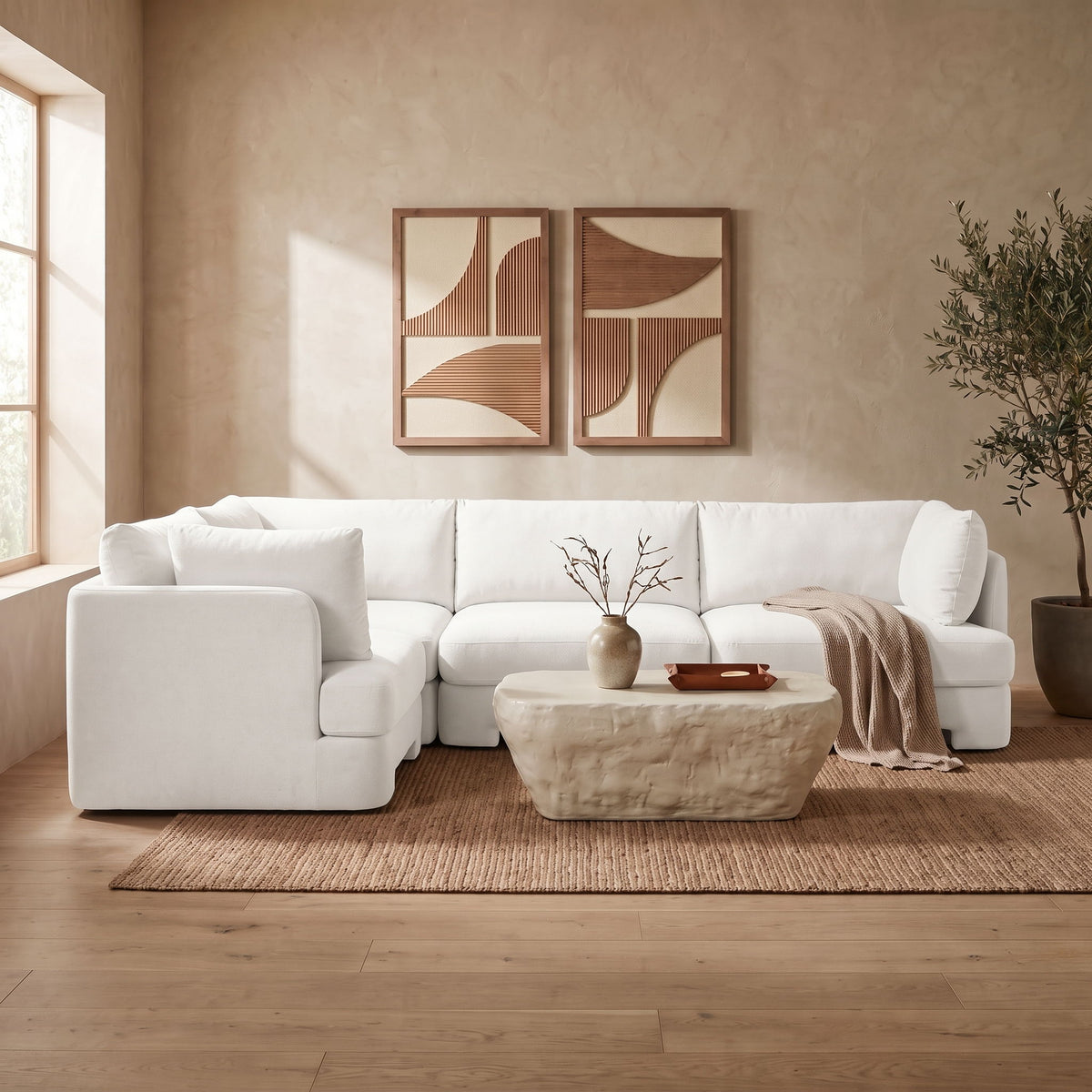 White velvet sectional sofa set with cushioned arms and seat sections