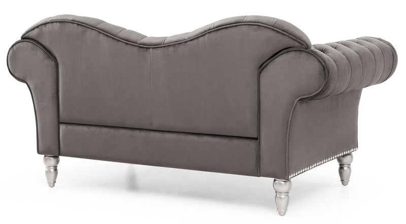 Gray fabric round arm loveseat with curved arms, stitched seat, and short metal legs.