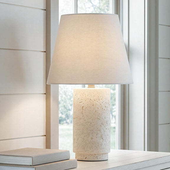Bronnerdale table lamp with off-white drum shade and speckled beige cylindrical base