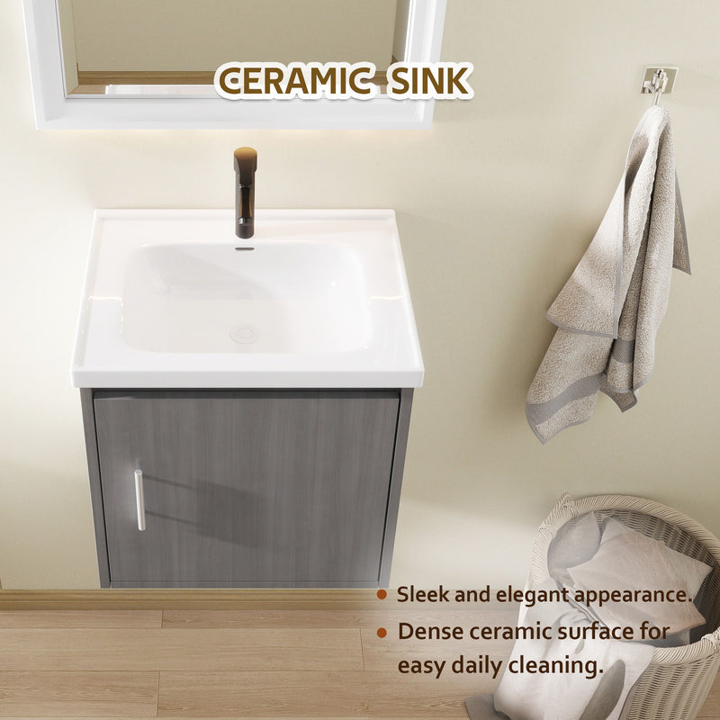 Wall-mounted bathroom vanity with white ceramic sink and gray soft-close door