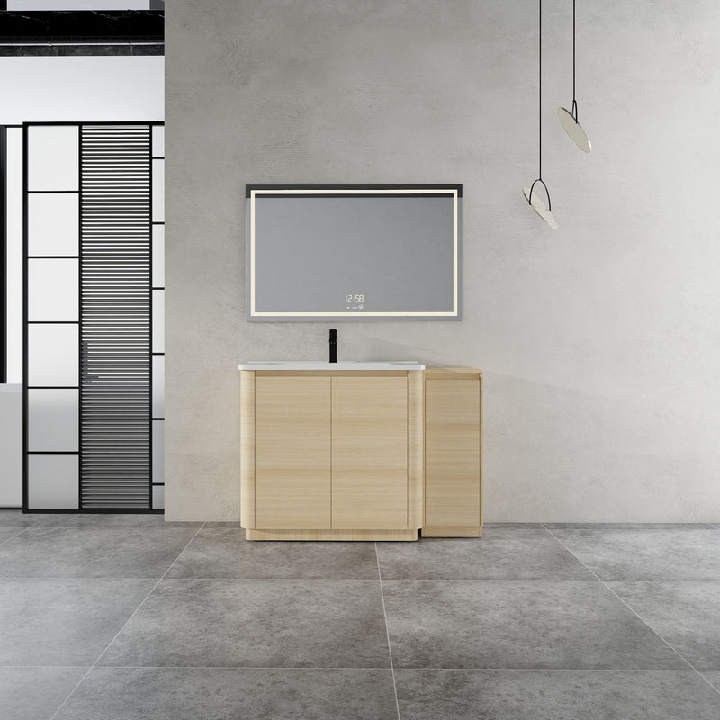 Freestanding bathroom vanity with white sink, light wood cabinet, and side storage compartment