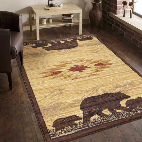 Beige lodge area rug with dark brown silhouettes and red geometric accents near center