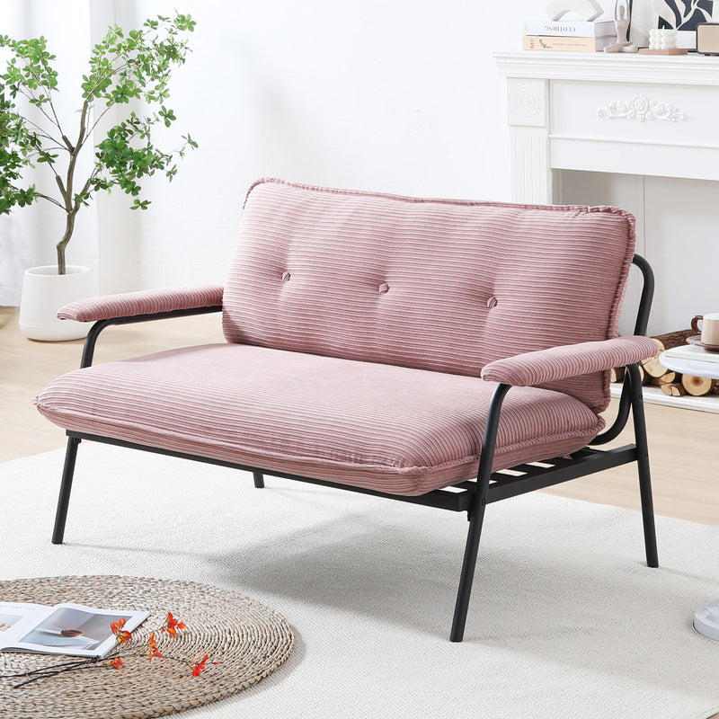 Pink metal frame sofa with striped upholstery and rounded arm cushions