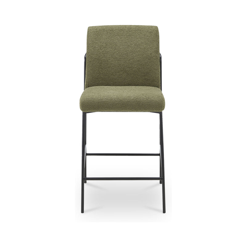Green upholstered counter stool with tall back, dark metal frame and bar footrest