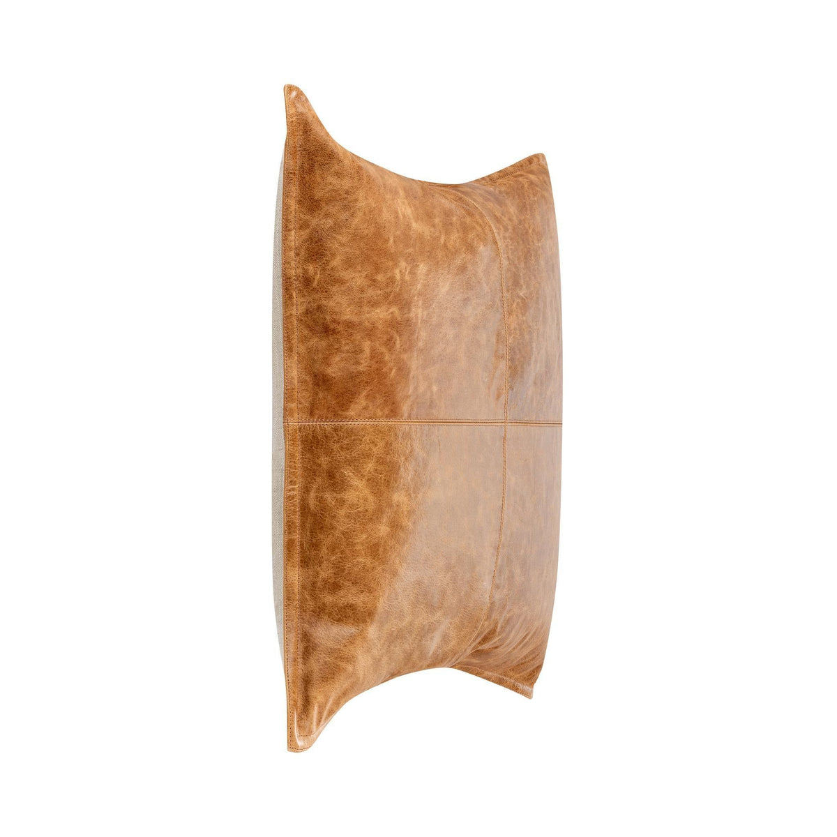 Tan leather lumbar pillow shown from the side with center seam detail.