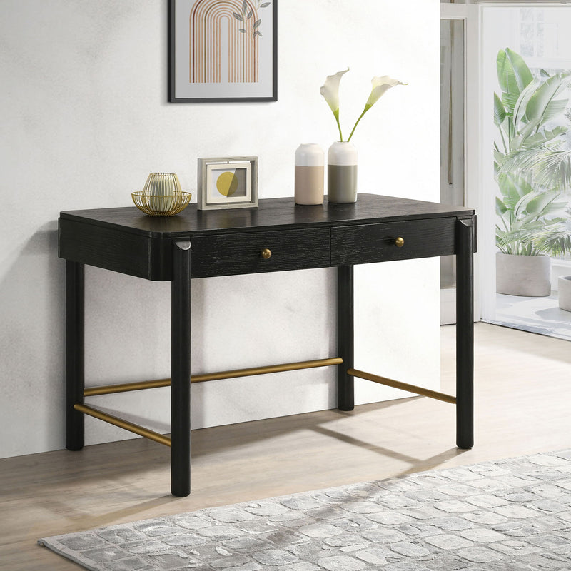 Black 2-drawer vanity desk with gold drawer pulls and metal-style support bars
