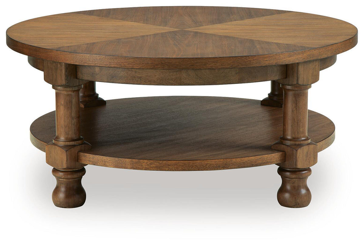 Chadworth - Round Cocktail Table - Medium Brown