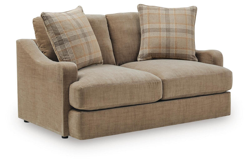 Beige upholstered loveseat with plaid throw pillows and two plain back cushions