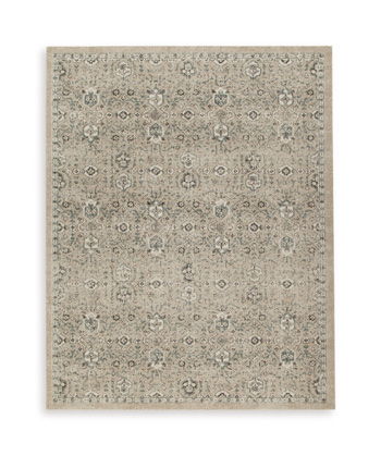 Beige rectangular rug with small geometric medallion motifs