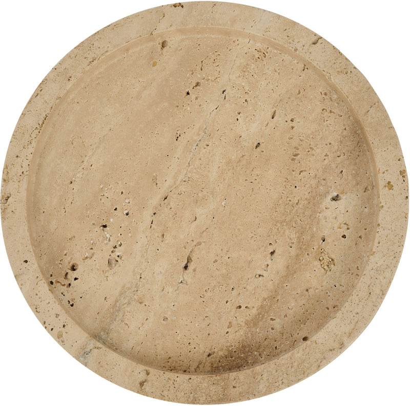 Beige travertine round tray close-up showing speckled, mottled stone surface.