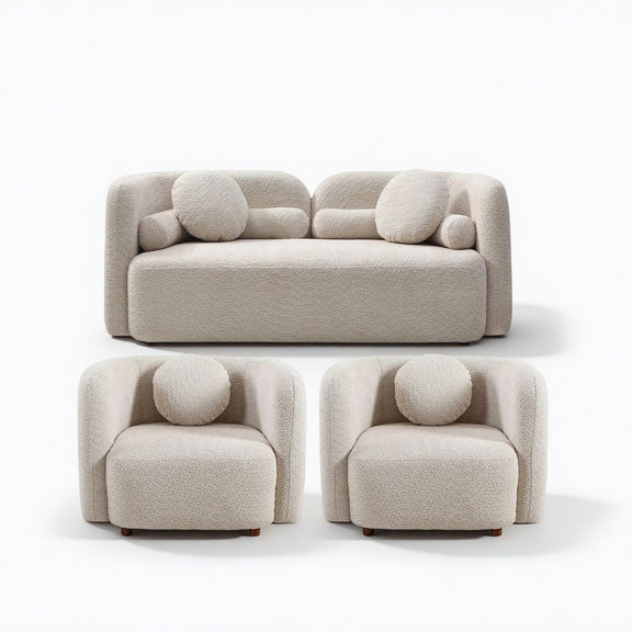 Beige upholstered sofa and two armchairs with round accent cushions
