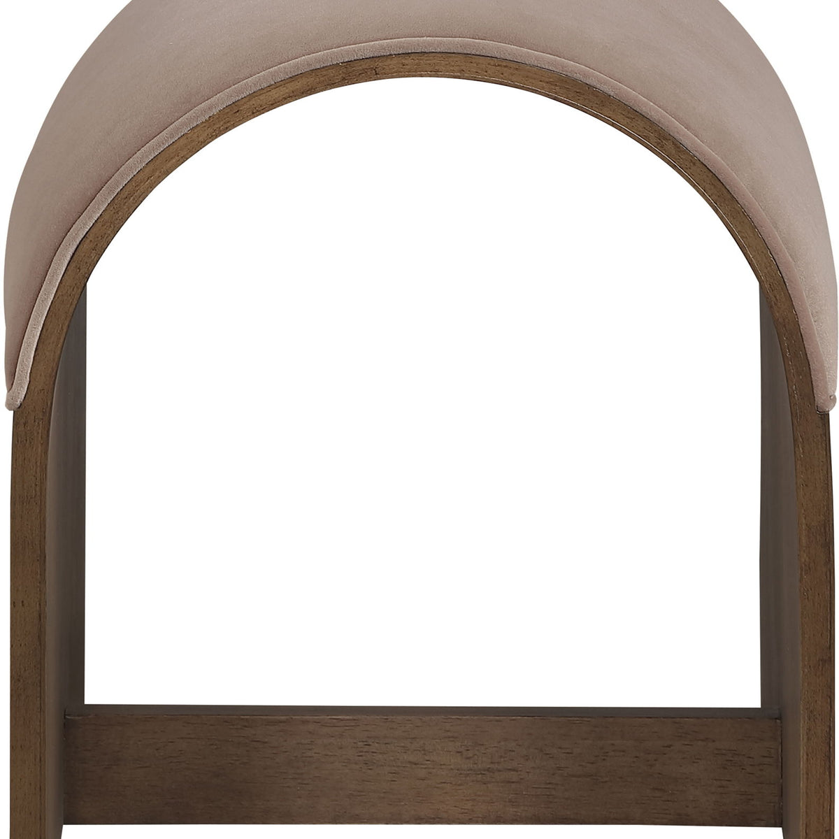 Close-up of beige velvet upholstered arched bench back with dark wood frame