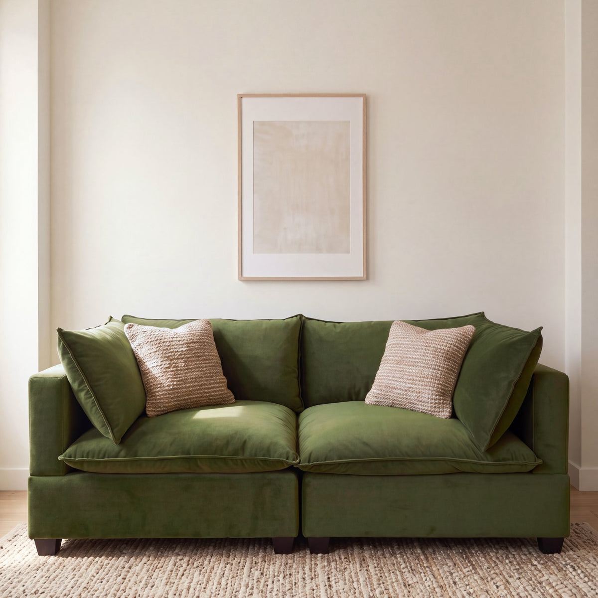 Olive green sectional sofa with two seat cushions and decorative pillows